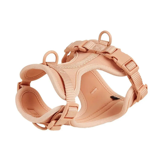 Peach-pink adjustable dog harness on white background